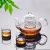 Import Heat-Resistant Glass Tea Set Stainless Steel Filter Glass Teapot from China
