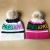 Import High Quality Custom Designed Logo Knit Cashmere Winter Warm Beanie Cap Hat With Pom Pom Plush Brim For Men And Women from Hong Kong