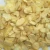 Import Hot sale new crop white natural dried dehydrated garlic flakes vegetables from China