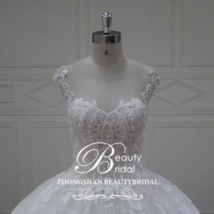 lifelike aesthete scalloped ananda wedding dress  with illusion neckline  wedding gown ball gown design