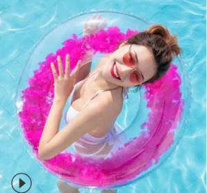 Manufacturers wholesale beach style net red sequin feather swimming ring adult thickened PVC inflatable transparent swimming rin