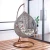 Import Outdoor Furniture Wicker Patio Swing Egg Rattan Hanging Chair for Leisure gold leg frame iron metal Basket cushion seat Hanging from China