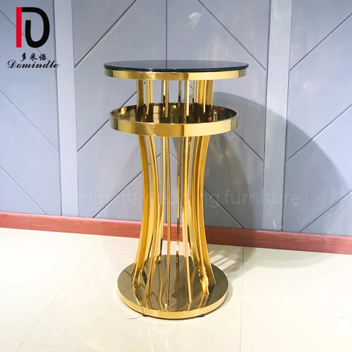 Round stainless steel base glass top wedding rental bar table