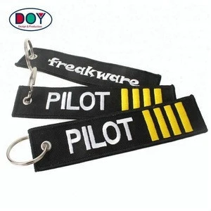 Wholesale Promotional Design Custom Brand Name Logo Fabric Embroidered Key Chain for Before Flight