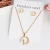 Import C&amp;J Simple 18K Gold Plated 26 Alphabet Jewelry Set Delicate Stainless Steel Letter Necklace from China