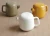 Import ceramic mini yellow teapot with filter on sale from China