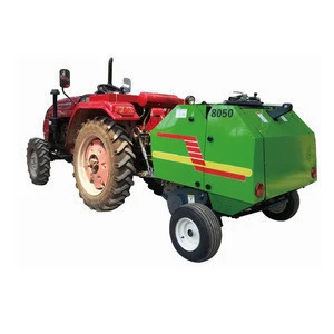four wheels tractor mounted round straw baler