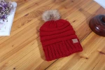 High-End Brand Bigh Quality 2021 Fashion Winter Snug Hat Women Knitting Hat Faux Fur Pom Poms Beanie Hat