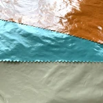 Hot Selling  Soft Light mirror surface PU membrane fashion trend special out looking 100% Polyester Nylon Taffeta  Fabric