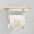 Import stainless steel waterproof toilet paper roll holder with shelf from China