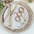 Import Summer Annes European and American Natural Wood Napkin Buckle Pastoral Style Wood Bead Tassel Wooden Napkin Rings from China