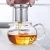 Import Wholesale Resists Heat Clear Flower Tea Glass Teapot with Steel Filter from China