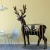Import wholesale shelf art mind Eco-friendly wood carving crafts of deer from China