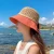 Import 2021 new summer sun hat mesh breathable fisherman hat hollow beach woven straw hat from China