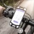 Import Bike Mount Universal Bicycle Mobile Phone Holder Adjustable Silicone Handlebar Rack for Mountain Bikes and Motorcycle from China