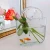 Import Cheap Price Handmade Glass Bag Vase Unique Wide Mouth Bubble Handbag Flower Vases For Home Decorative from China