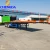 Import Chengda 20Ft 40Ft Flat Bed Flatbed Trailer Truck Semi Trailer 3 Axle from China