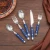 Import China full set of fork spoon knife with blue plastic handle machine polish stainless steel  restaurant cutlery set from China