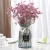 Import customized color wide mouth glass vase for home decoration from China