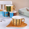 Factory Direct Selling Ceramic Cups& Saucers Angel Wing Handle Porcelain Cup Sets With Saucers Gold Handle Coffee Cups& Sauces