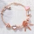 Import Fashion Jewelry DIY Tassel Bracelet Popular Rose Gold Hollow Out Bead Bracelet With Romantic Zircon Petals from China