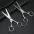 Import "GOLDOLLAR 201"stainless steel Household barber hair scissors 5.5 inch set of two piece from China