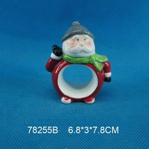 Handpainted ceramic christmas napkin ring with santa claus design
