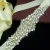 Import high quality handmade rhinestone bridal belt silver crystal wedding white sash waist belt for women dress from China