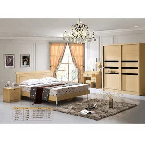 hotel bedroom furniture with wooden bed and wardrobe