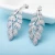 Import LUOTEEMI American CZ Diamond Party Wear Fashion 18k White Gold Leaf Shape Copper Crystal Statement Earrings from China