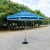 Import Outdoor patio round umbrella big parasol outdoor folding garden umbrellas with base stand from China