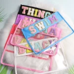 Personalized Waterproof Pvc Zipper Toiletry Bag Transparent Chenille Letter Patches Makeup Organizer Bag Clear Cosmetic Bag