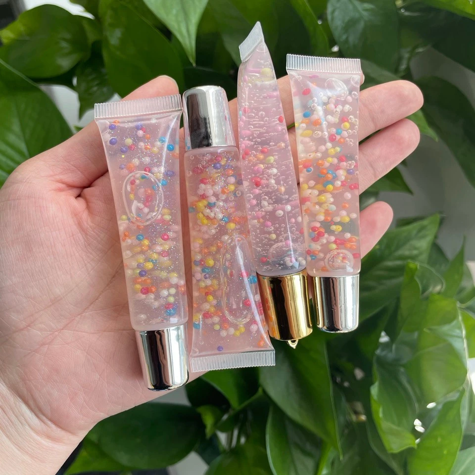 wholesale Transparent Wand Tube Lipgloss Lollipop Shimmer Shiny Lip Gloss Private Label for kids and teeneger
