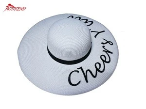 Women&#39;s floppy straw hat with embroidery on brim with adjustable fit band