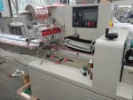 Automatic Pillow Tissue Sanitary Pad Baby Diaper Packaging Packing Machine Price