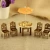 Import Children play home simulation umbrella wood table and chair mini creative furniture utensils wooden kitchen toys from China
