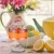 Import Easy use fruit tool manual plastic lemon juicer orange squeezer with strainer and container from China