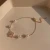 Import Fashion Pearl Jade Bracelets Vintage Camellia Pearl Beads Bangles Bracelets For Girls Adjustable Bracelet from China