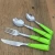 Import Guangdong Cutlery Factory Set of 24pcs Plastic Handle Flatware Set with green handle from China