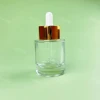 High Grade Red Green Clear Serum bottle glass bottles for hair oil droppers Aluminum dropper bottle