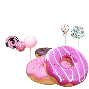 Hot sale Fiberglass Macaroon seating sculptures resin donuts statue for candyland store bakery decoration