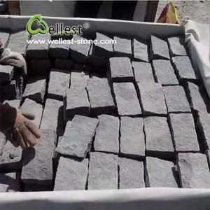 Natural split face g654 cobbles,China cheap granite landscaping stone