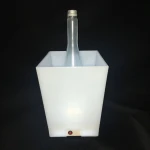 white plastic square ice bucket with led