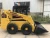 Import Earth moving machinery front end wheel loader mini skid steer loader with multifunctional attachments from China