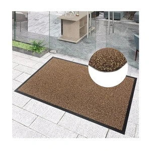 Colombia market customize designer mats tufted curly grass yarn cleaning foot mat with PVC bottom