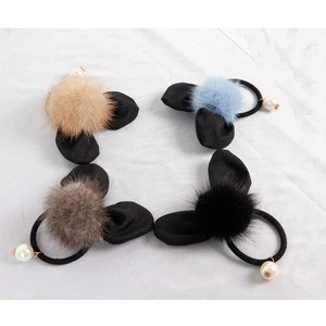 Multi style raccoon hair ball with hair accessories that girls like.
