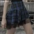 Import OPQ-602 punk rave woven fabric light and breathable plaid mesh stitching womens skirts from China