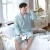 Import 2020 new lovers nightgown lake blue strip flannel comfortable bathrobe made of polyester fabric for home hotel from China
