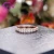 Import American popular jewelry style brilliant cut oval moissanite ring half eternity band in rose gold from China