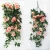 Import Artificial wall hanging flower hanging basket flower decorative roses flowers vine from China
